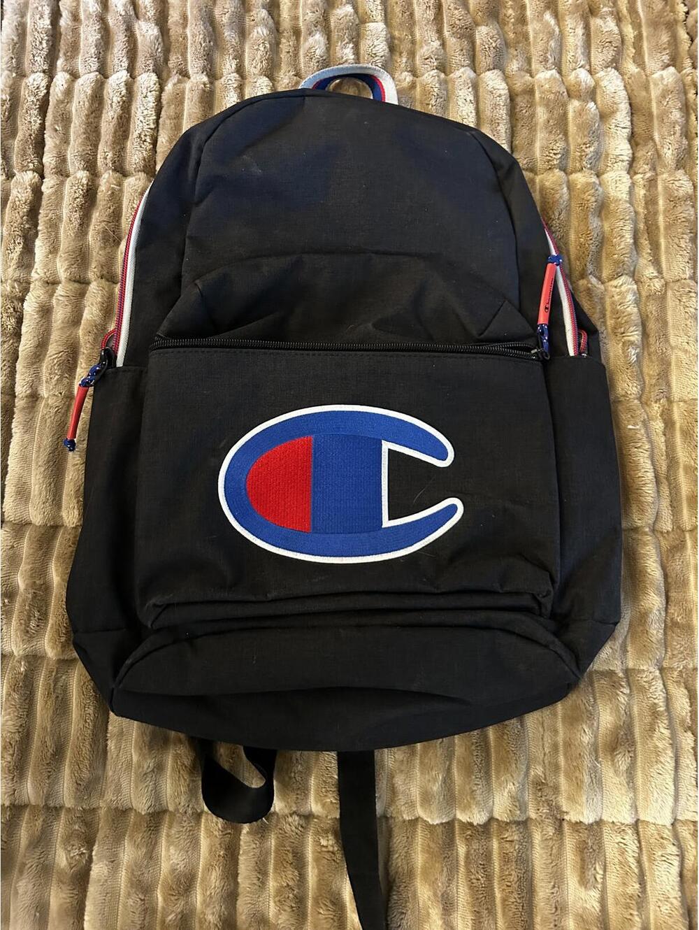 Champion Black Backpack with Red and Blue Accents